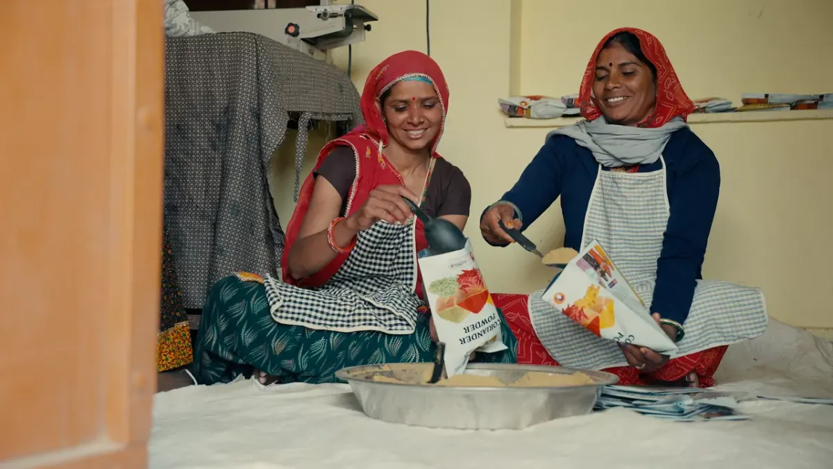 Two women preparing products at a small home business